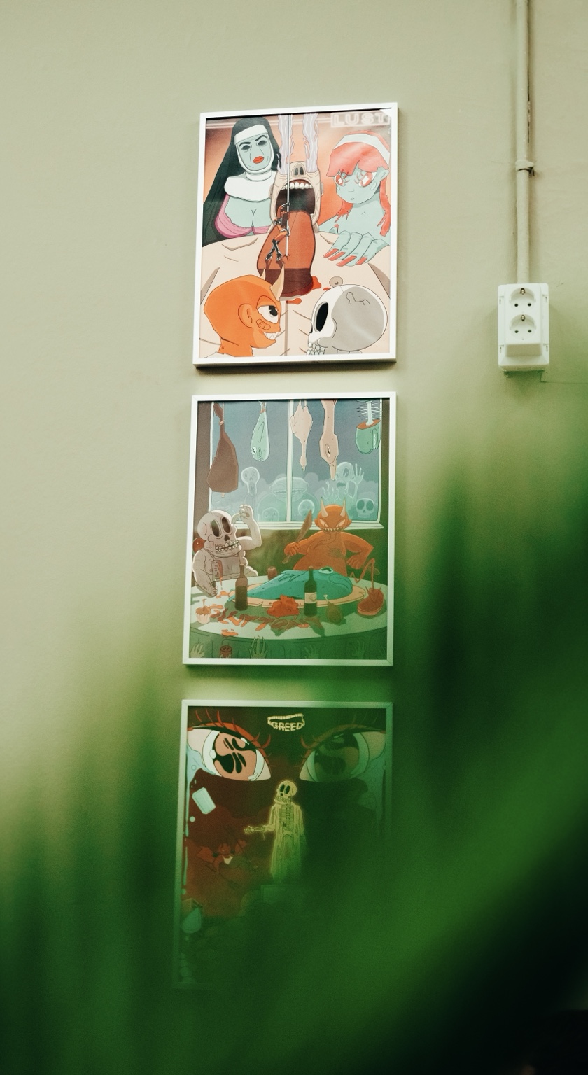 Interieur en wall art in Menace Barbershop Breda